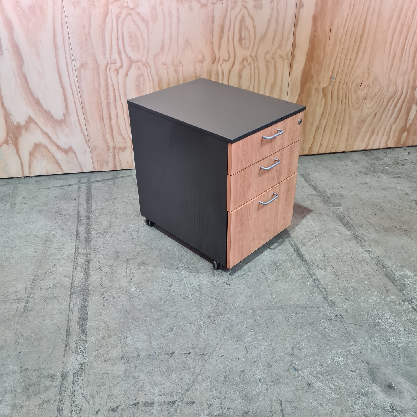 Charcoal and tan pedestal