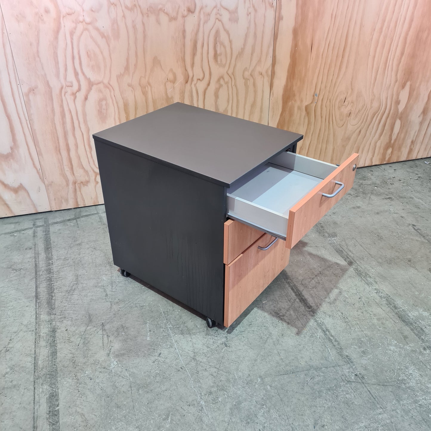 Charcoal and tan pedestal