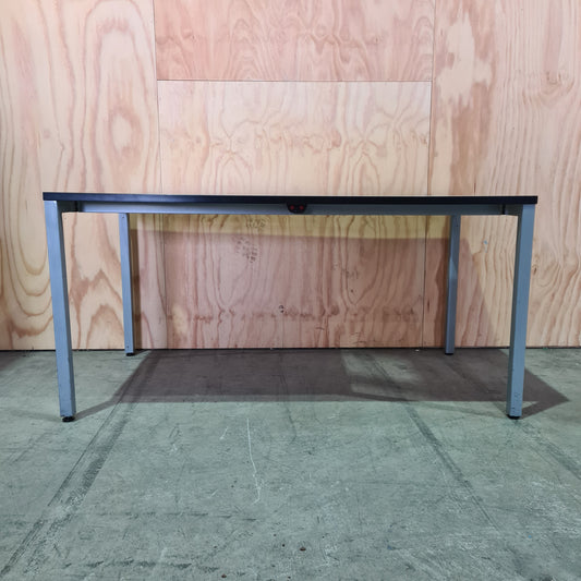 White meeting room table on metal legs