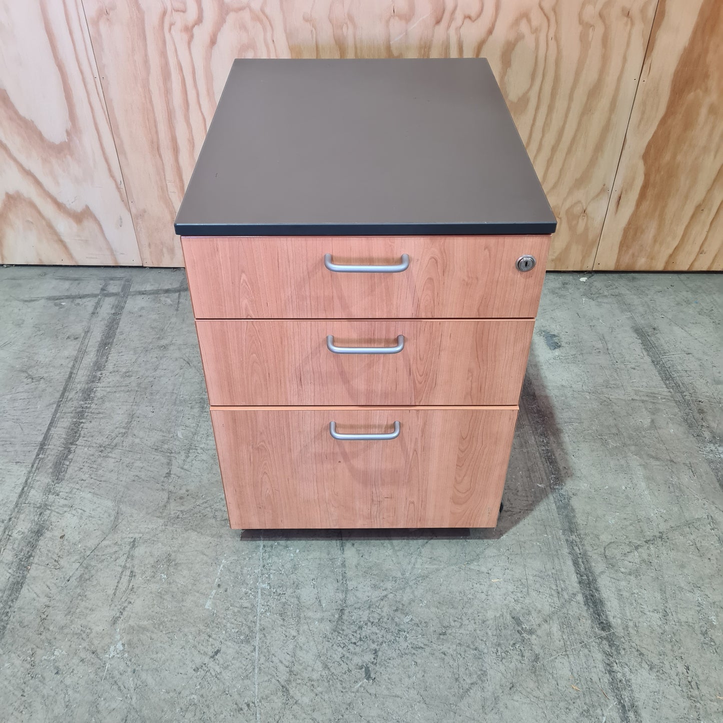 Charcoal and tan pedestal