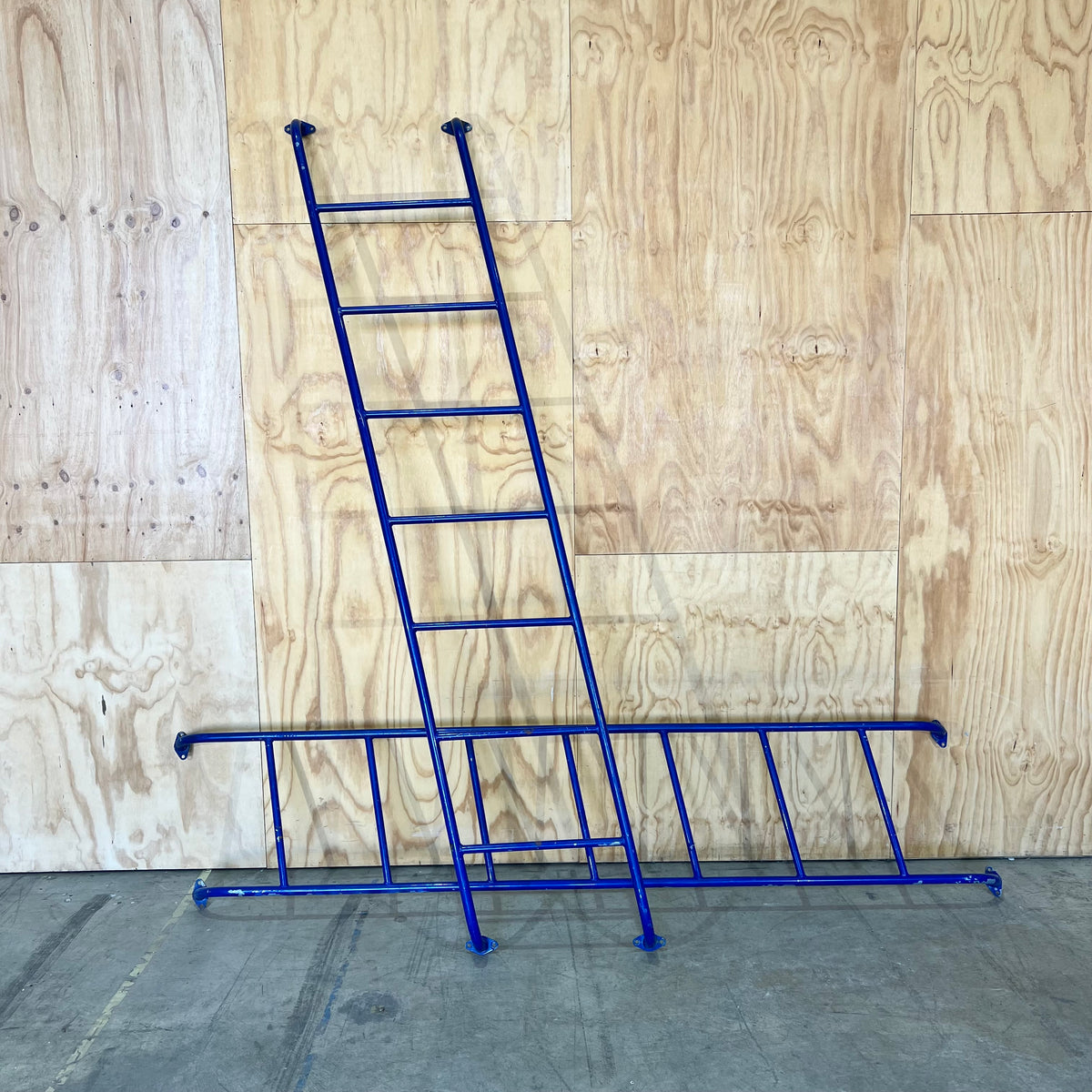 Set of Blue Metal Playground Skewed Ladders