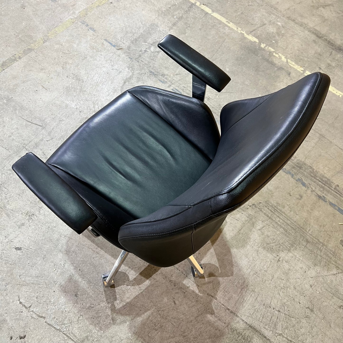Black leather executive chair with arms