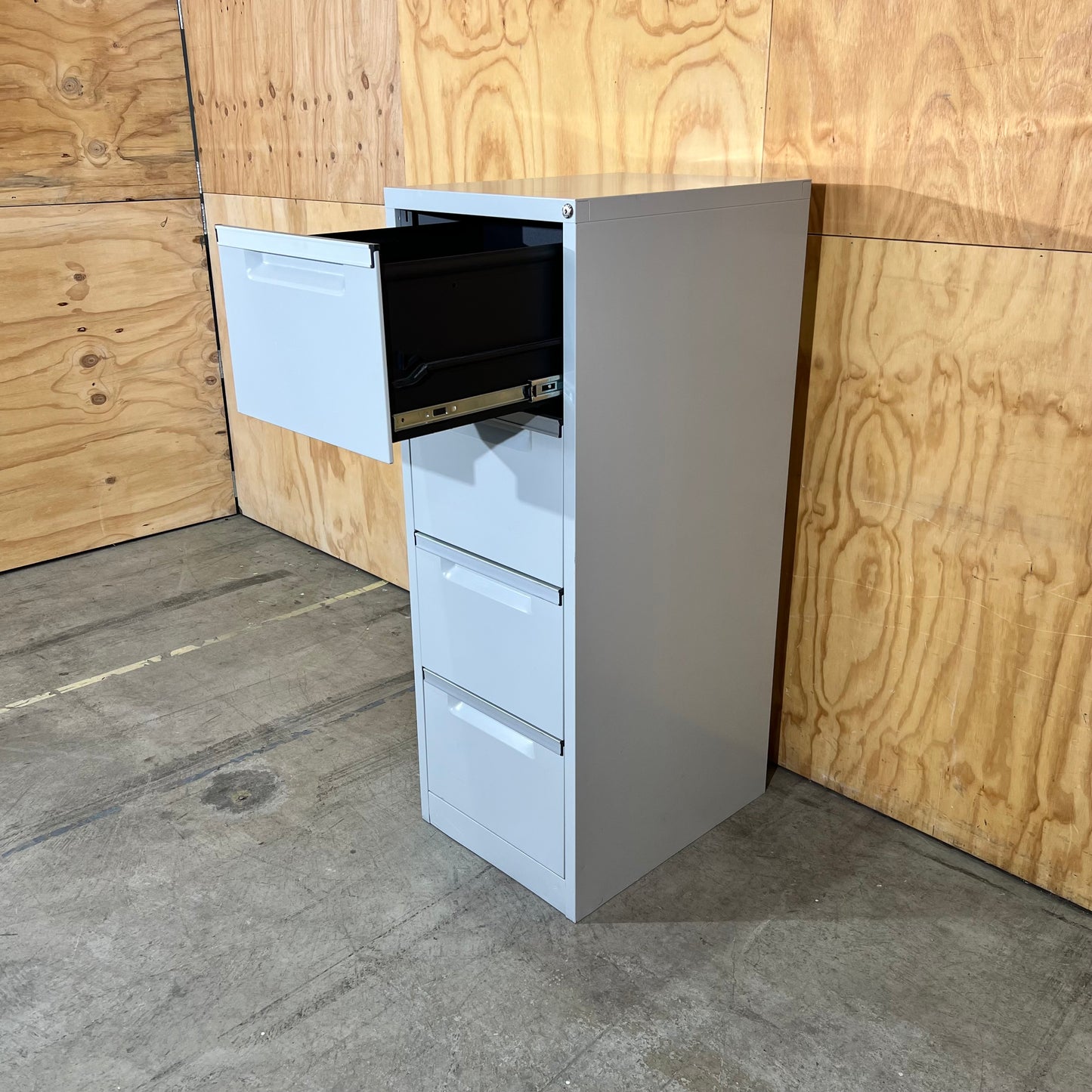Grey Metal Four Drawer Filing Cabinet