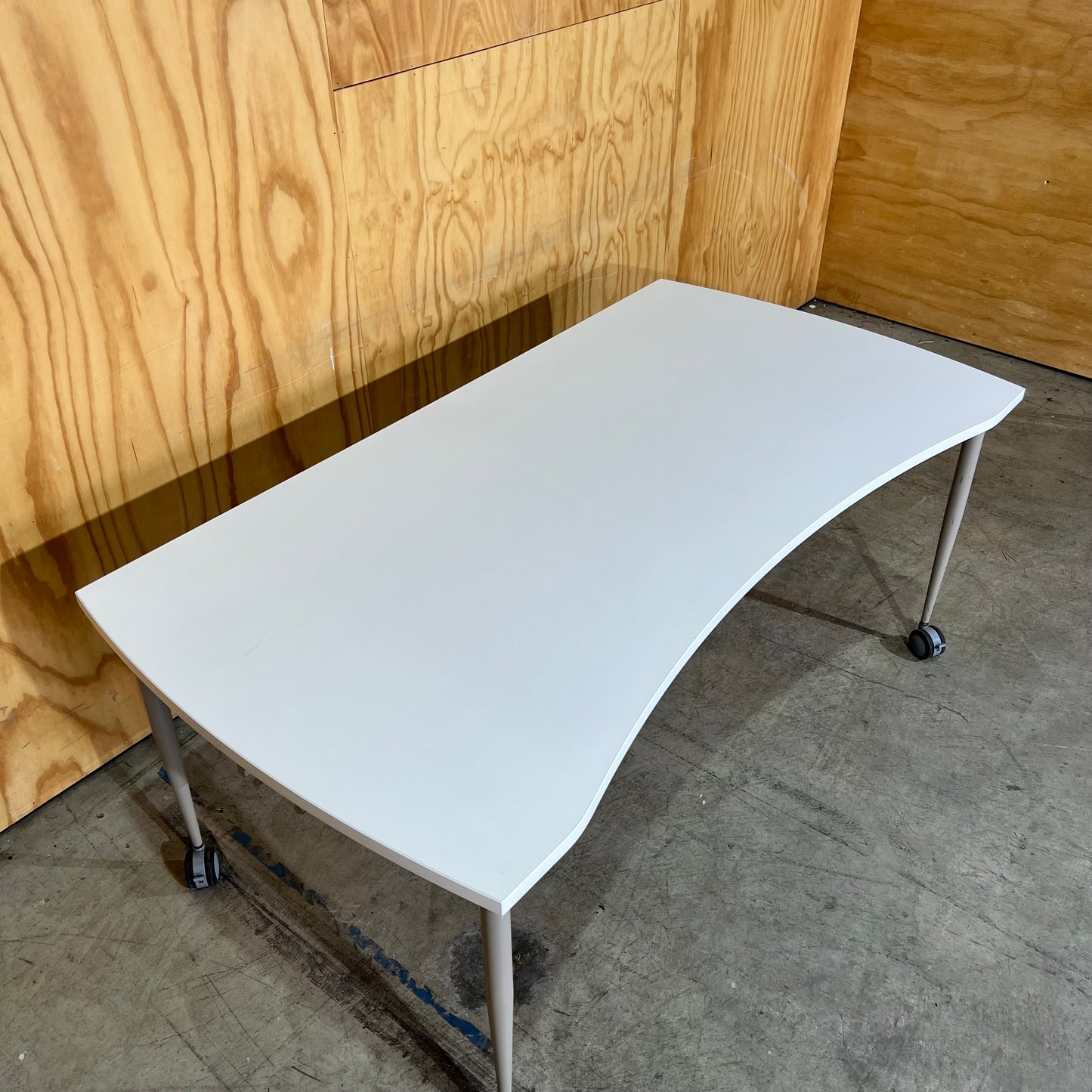 Whie Curved Desk on Castor Wheels
