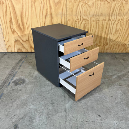 Charcoal and tan pedestal