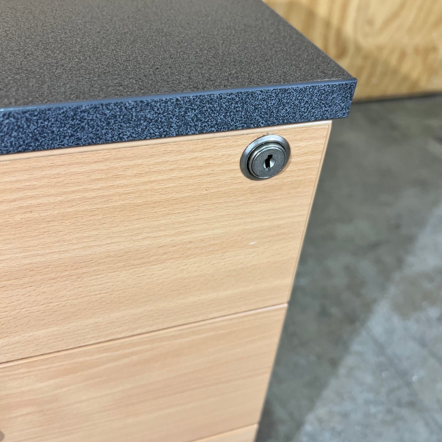 Charcoal and tan pedestal