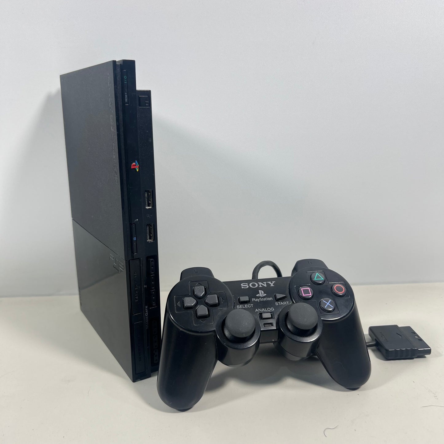 Sony PlayStation 2 Slim SCPH-90002 With a Controller