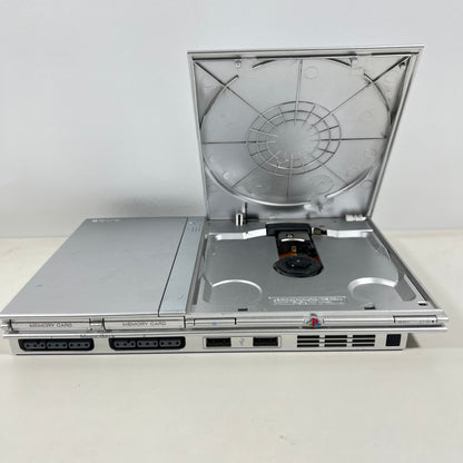 Sony PlayStation 2 Silver Slim with a Silver DualShock Controller 2 Only