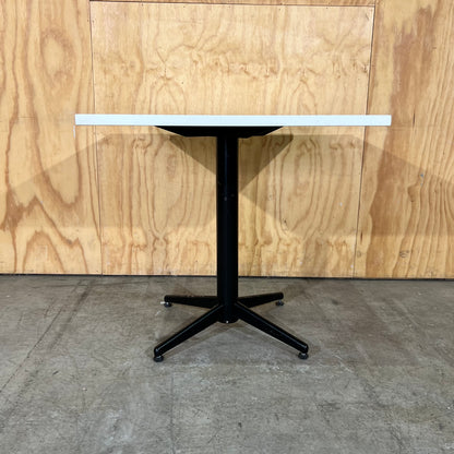 Square White Table on Black Metal Base