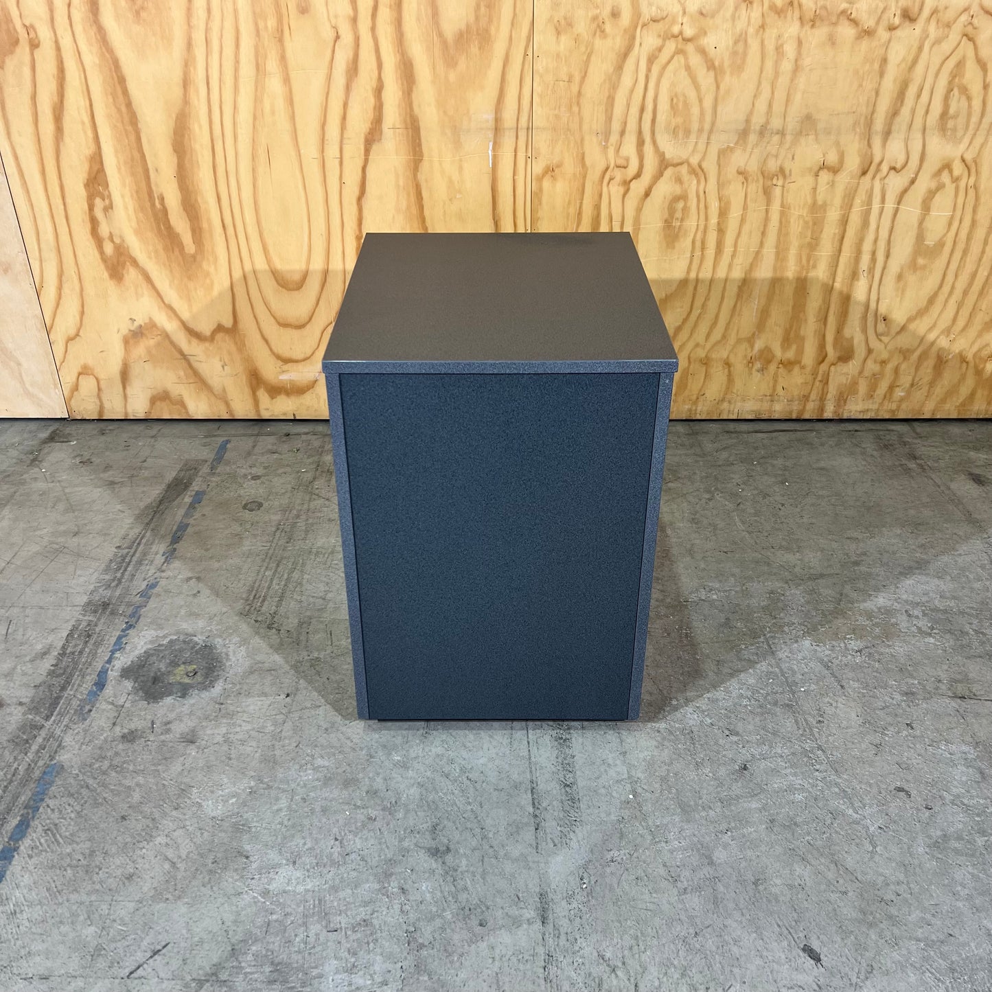 Charcoal and tan pedestal