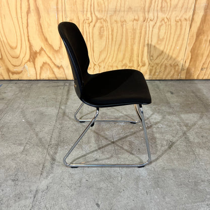 Black fabric and moulded plastic visitors chair