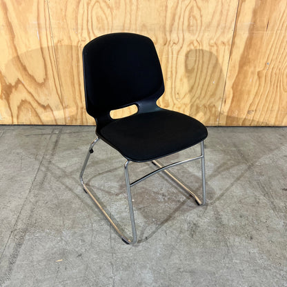 Black fabric and moulded plastic visitors chair