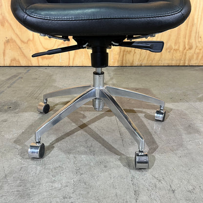Black leather executive chair with arms