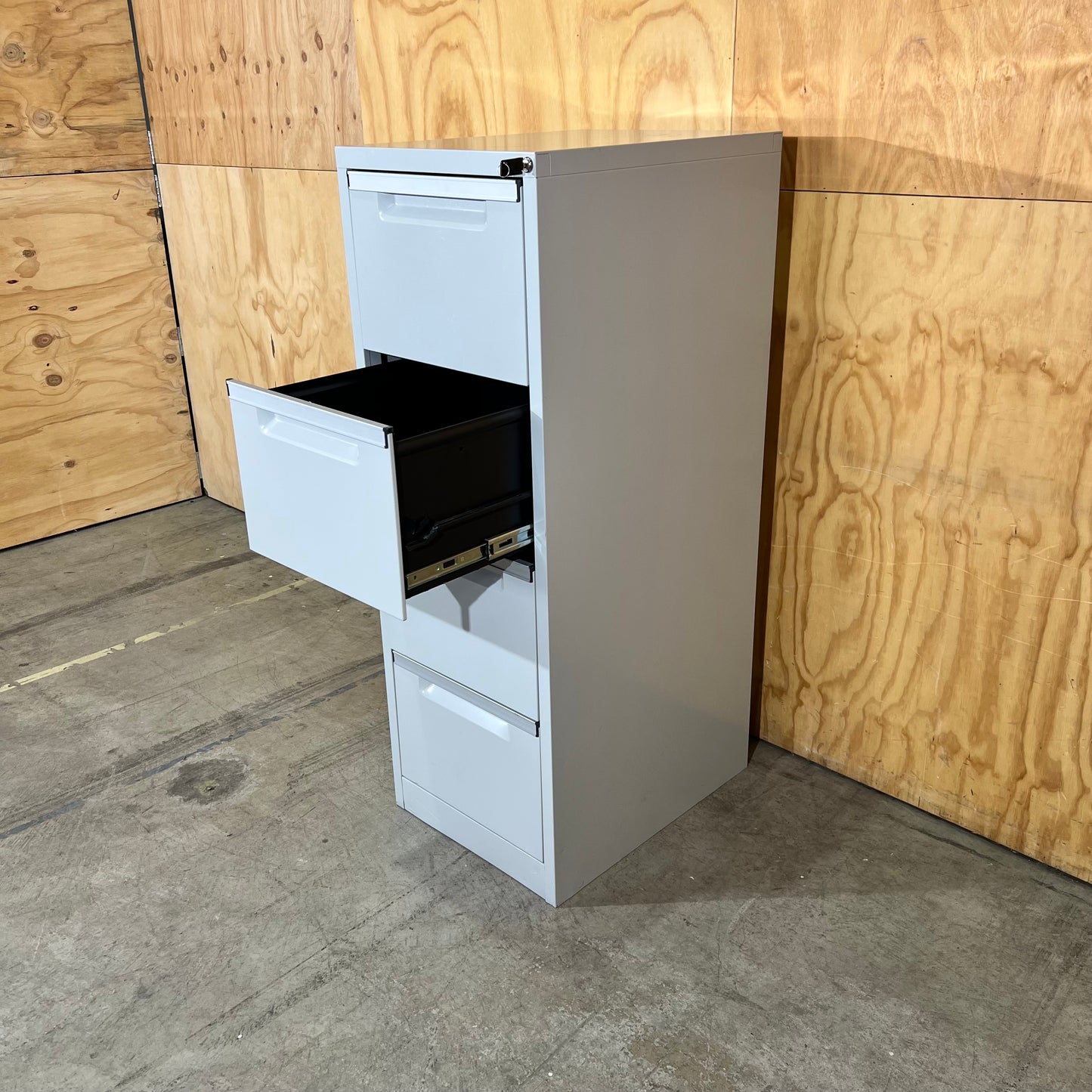 Grey Metal Four Drawer Filing Cabinet