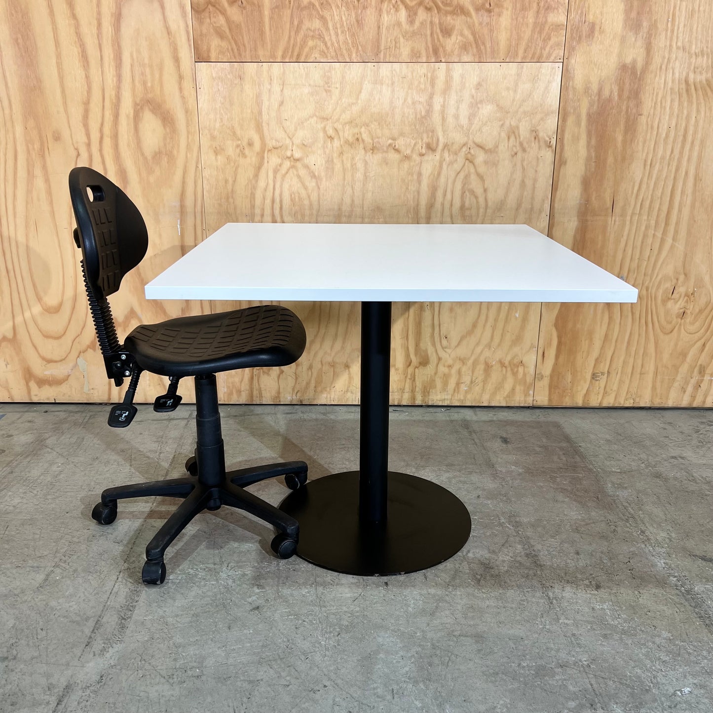 White Square Table on Black Metal Base