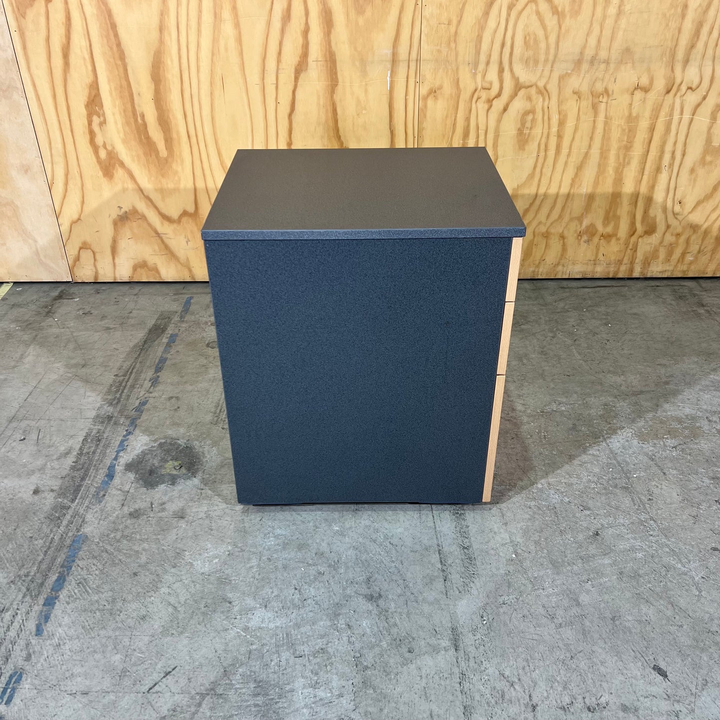 Charcoal and tan pedestal