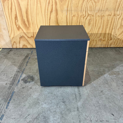 Charcoal and tan pedestal
