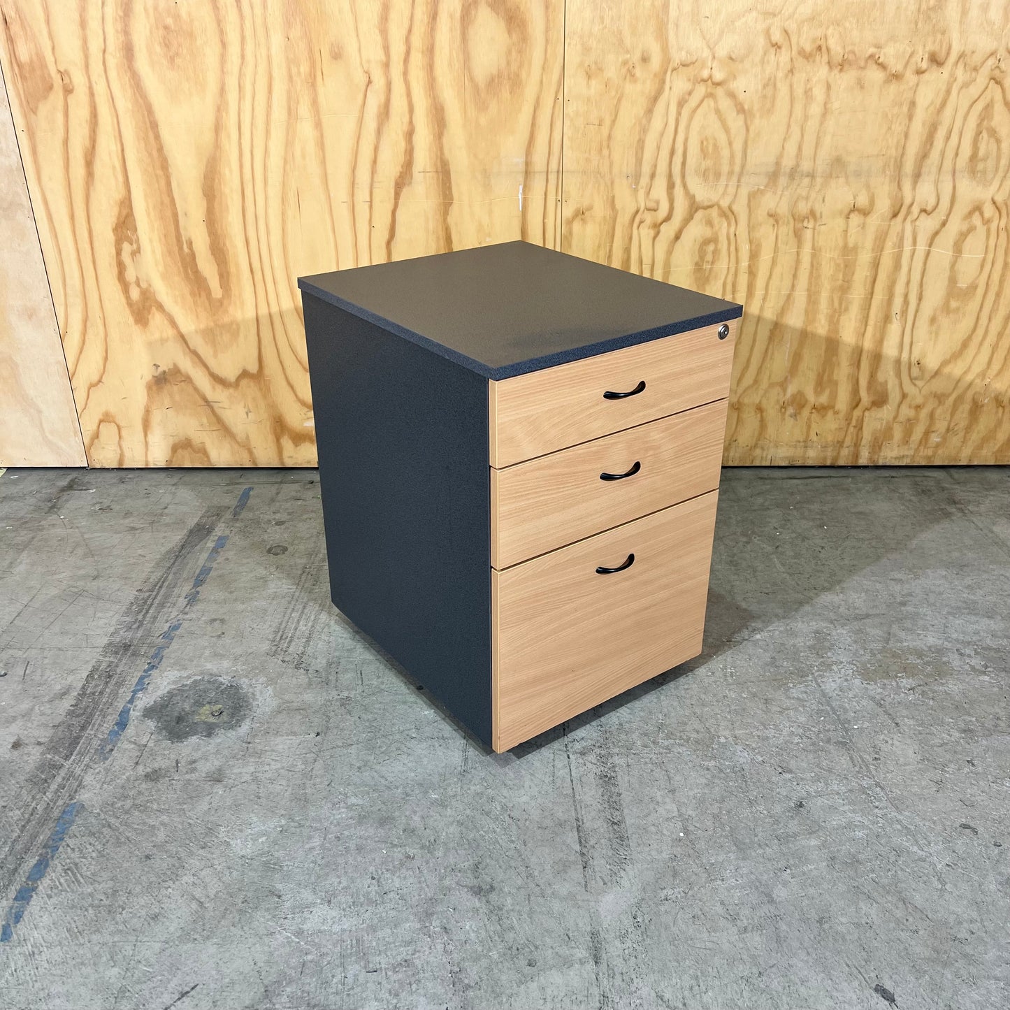 Charcoal and tan pedestal