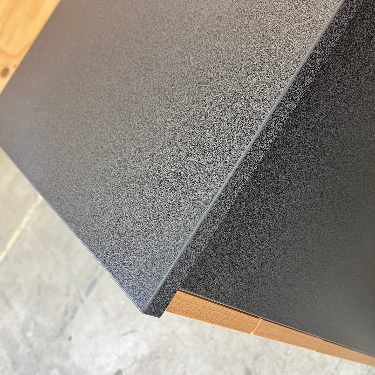 Charcoal and tan pedestal
