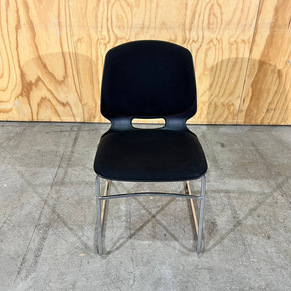 Black fabric and moulded plastic visitors chair