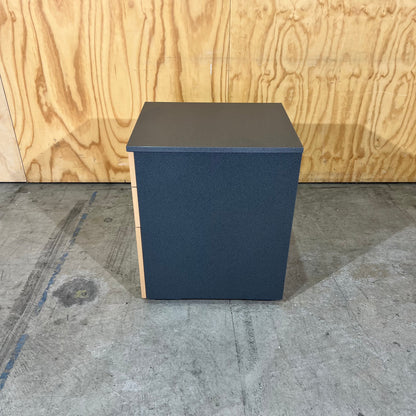 Charcoal and tan pedestal