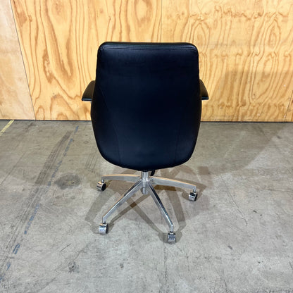 Black leather executive chair with arms