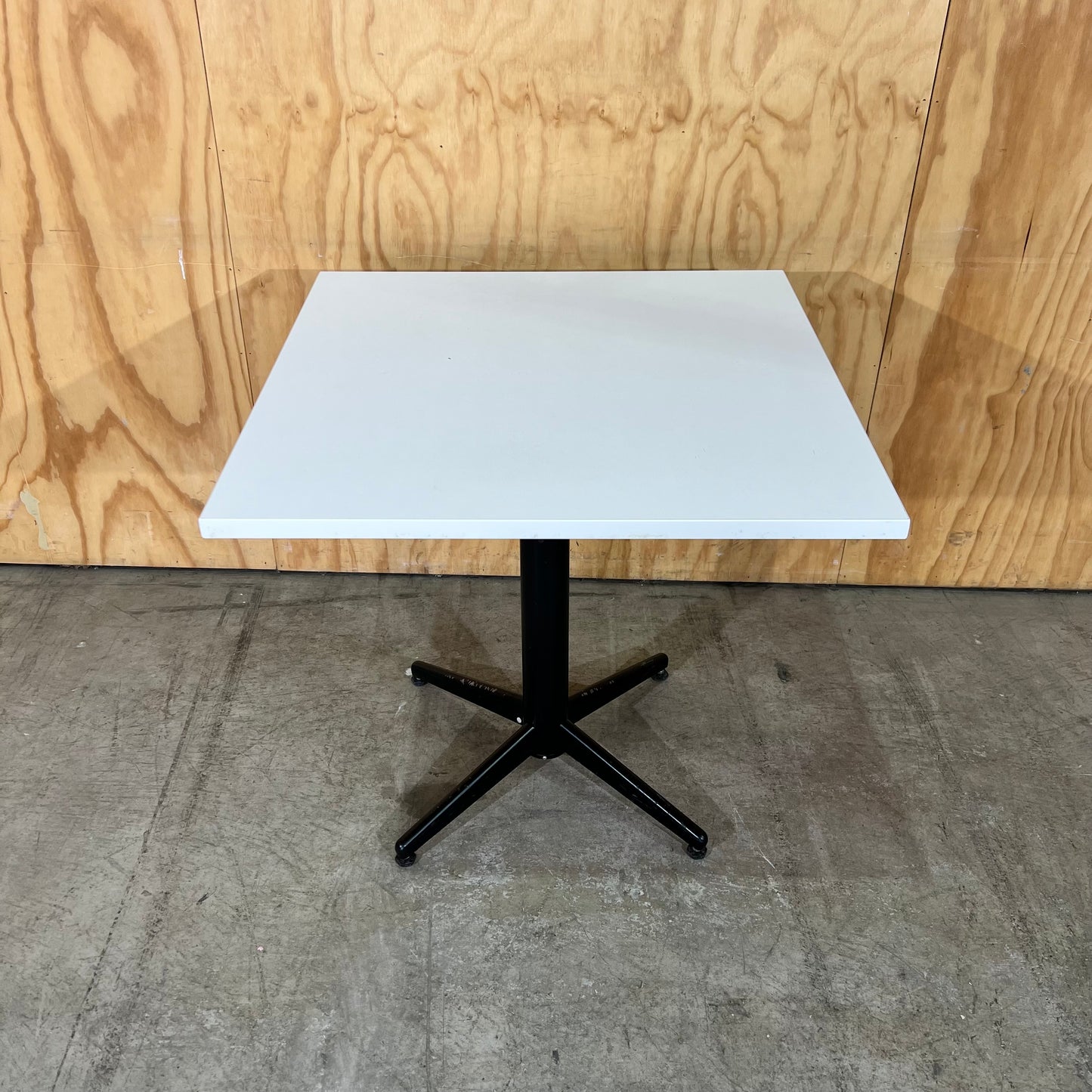 Square White Table on Black Metal Base