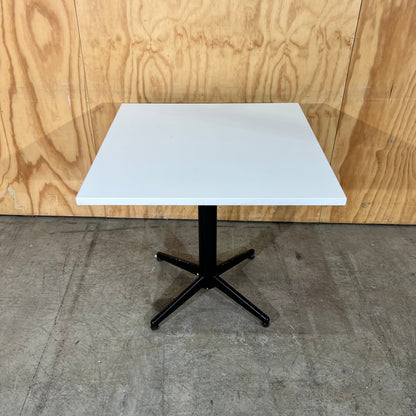Square White Table on Black Metal Base