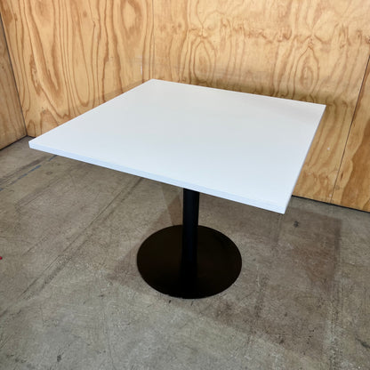 White Square Table on Black Metal Base
