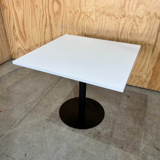 White Square Table on Black Metal Base