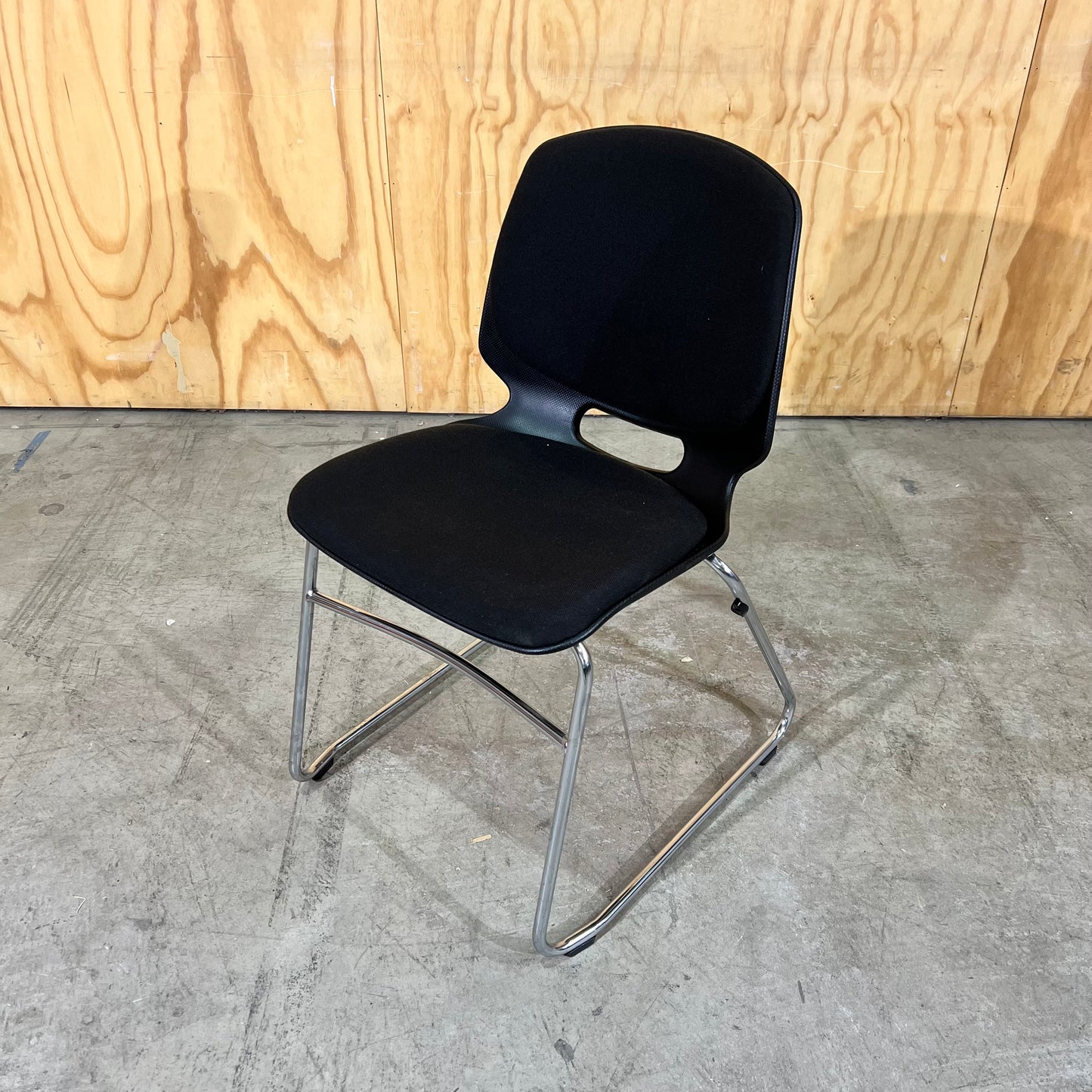 Black fabric and moulded plastic visitors chair