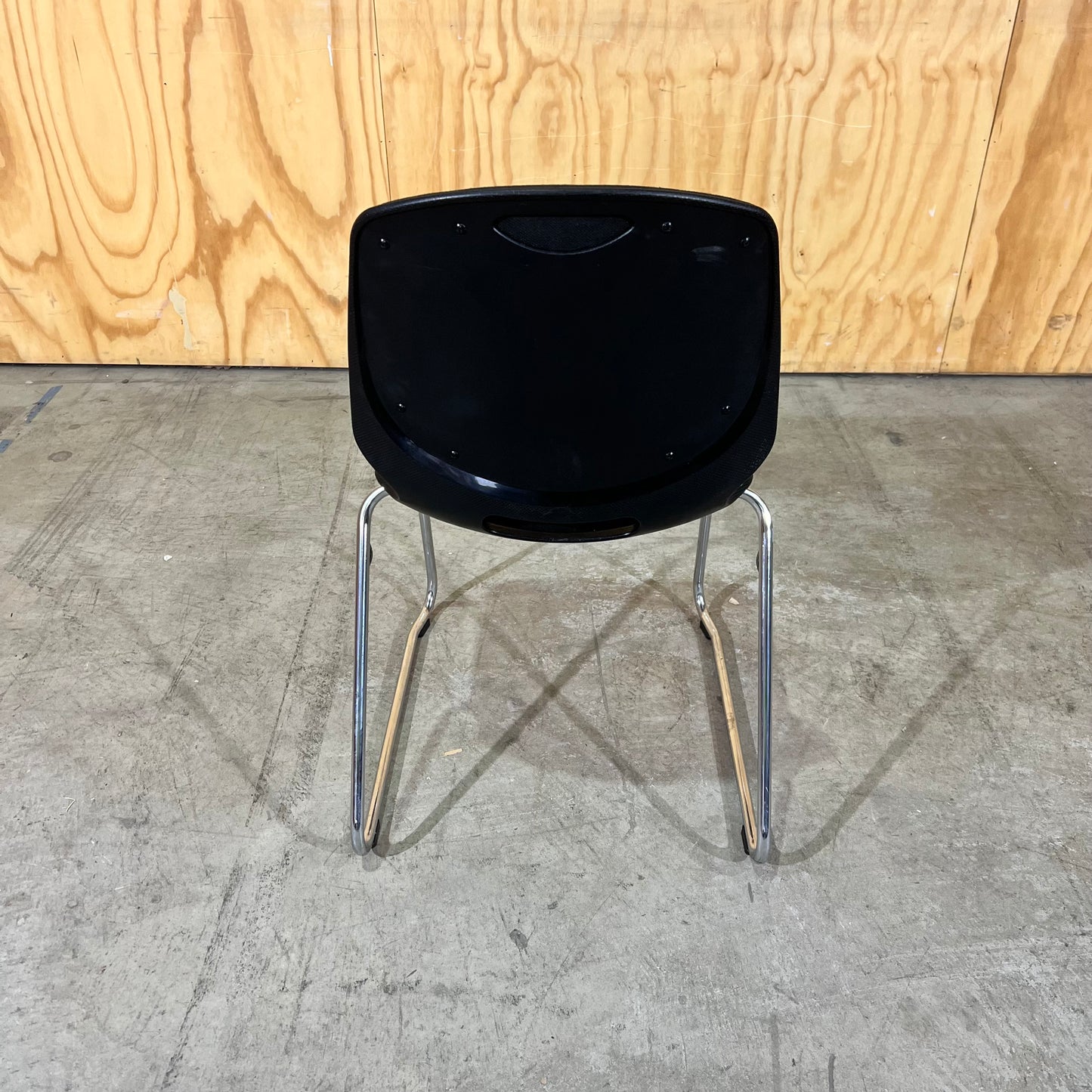 Black fabric and moulded plastic visitors chair