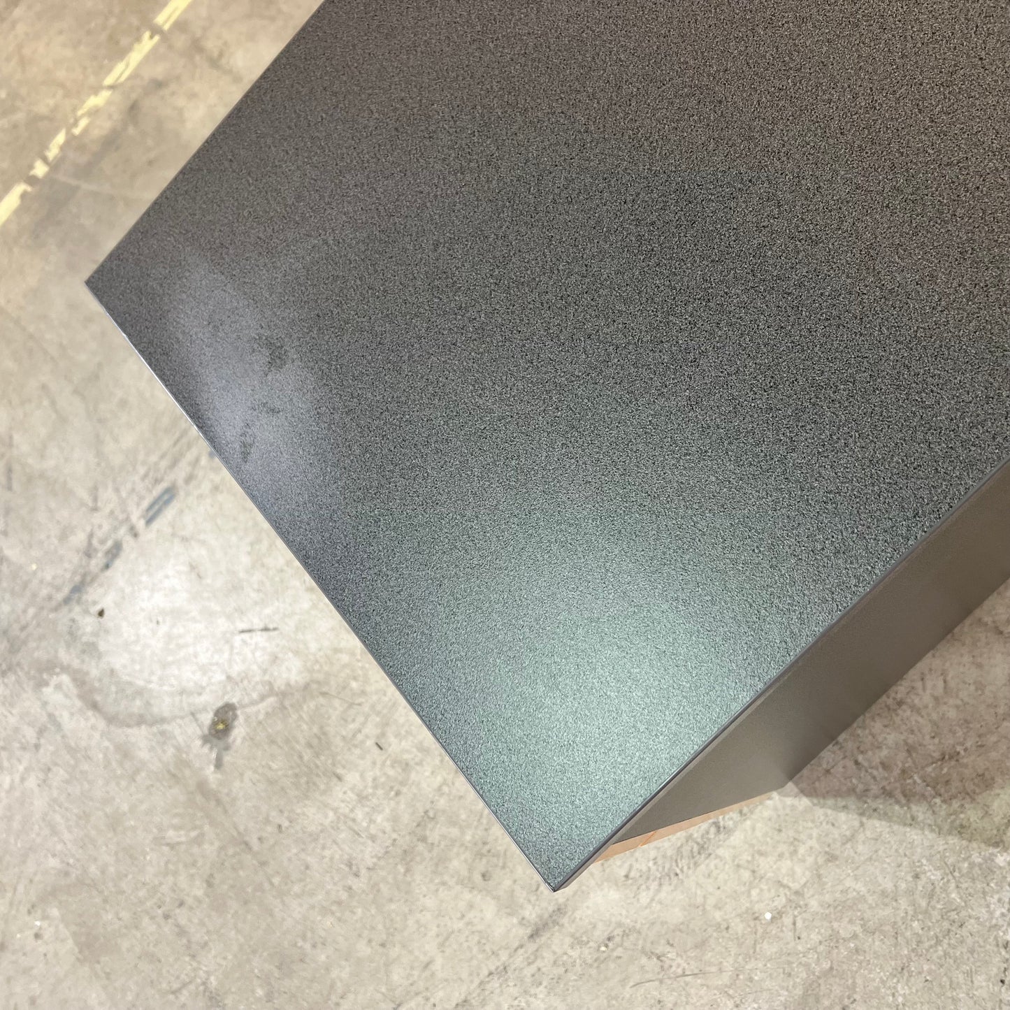 Charcoal and tan pedestal