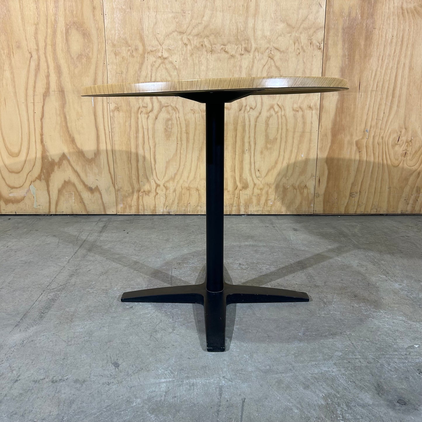 Round Timber Laminate Table with Black Metal Base