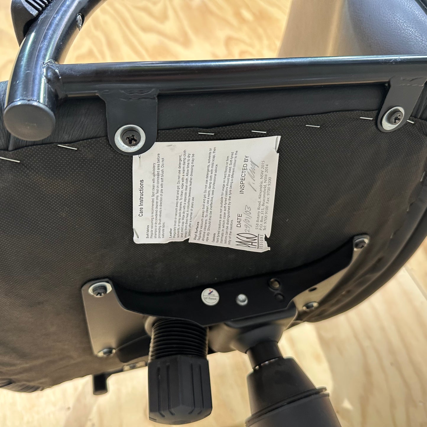 Black faux leather swivel chair on chrome base by Pago