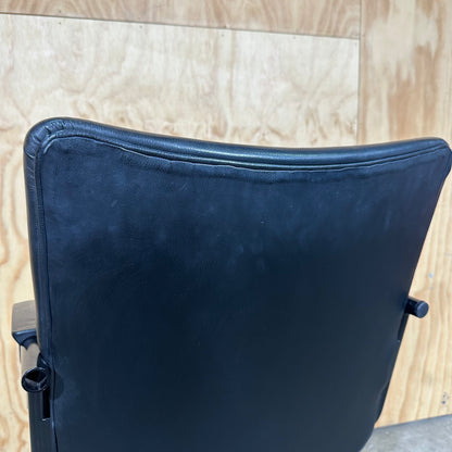 Black faux leather swivel chair on chrome base by Pago