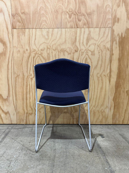 Blue Patterned Waiting Room Chair on White Sled Legs