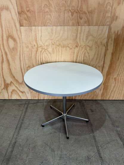 White round meeting table on 5 star chrome base