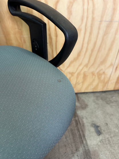 Green fabric covered office chair