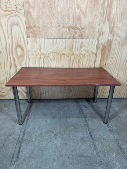 Timber veneered meeting table on chrome legs