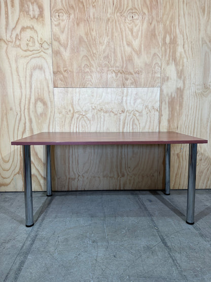 Timber veneered meeting table on chrome legs