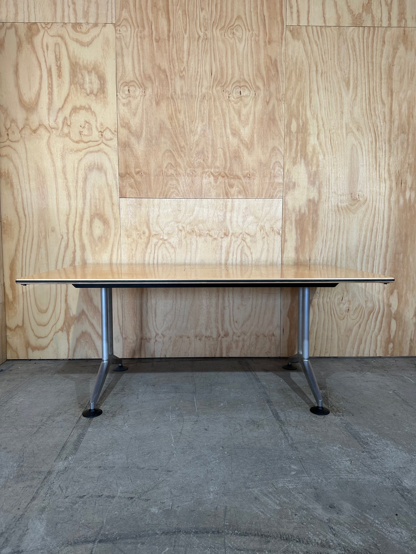 Meeting table with chrome legs and powerbox