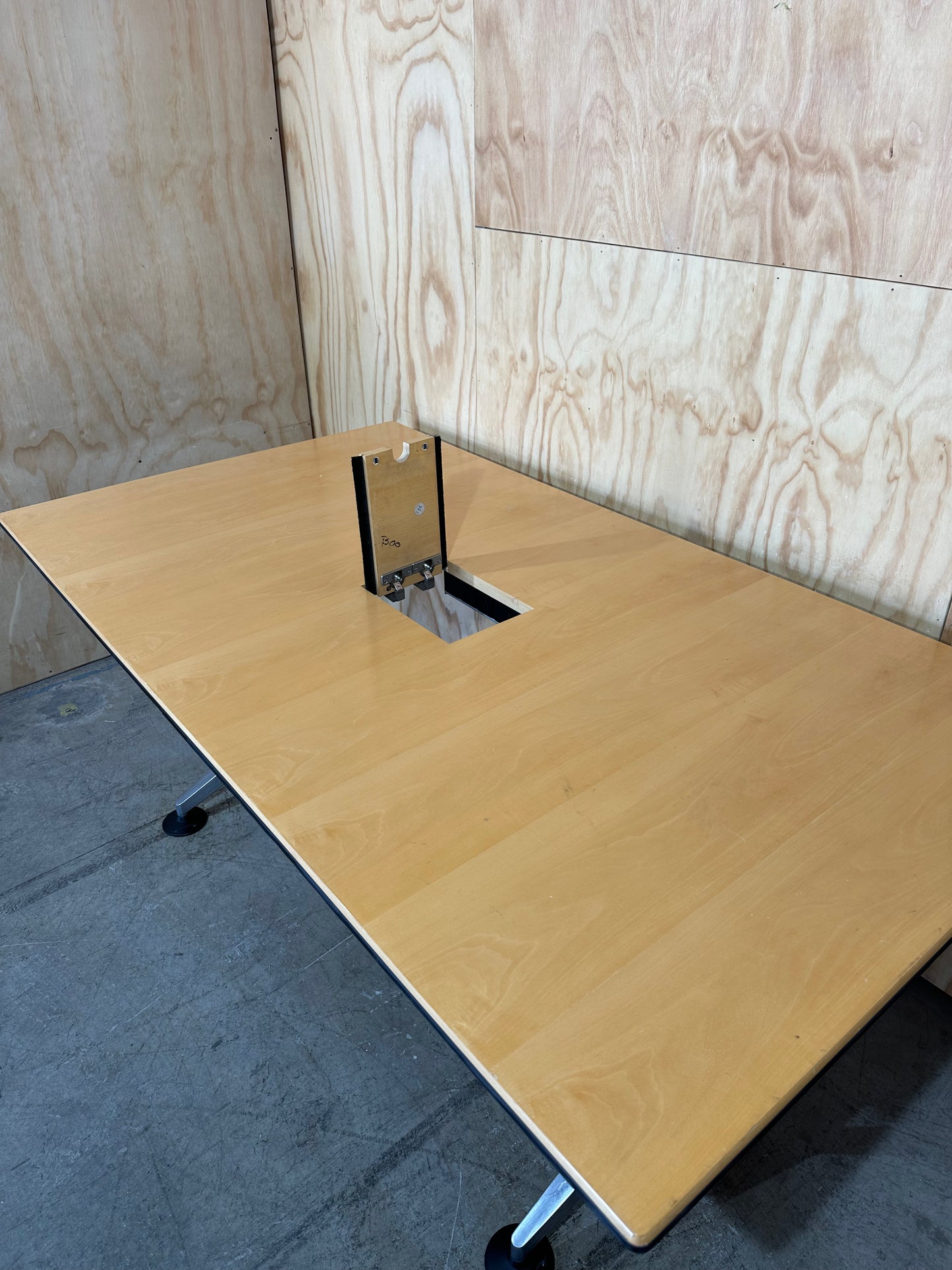 Meeting table with chrome legs and powerbox