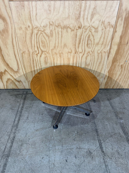 Round timber coffee table on chrome base