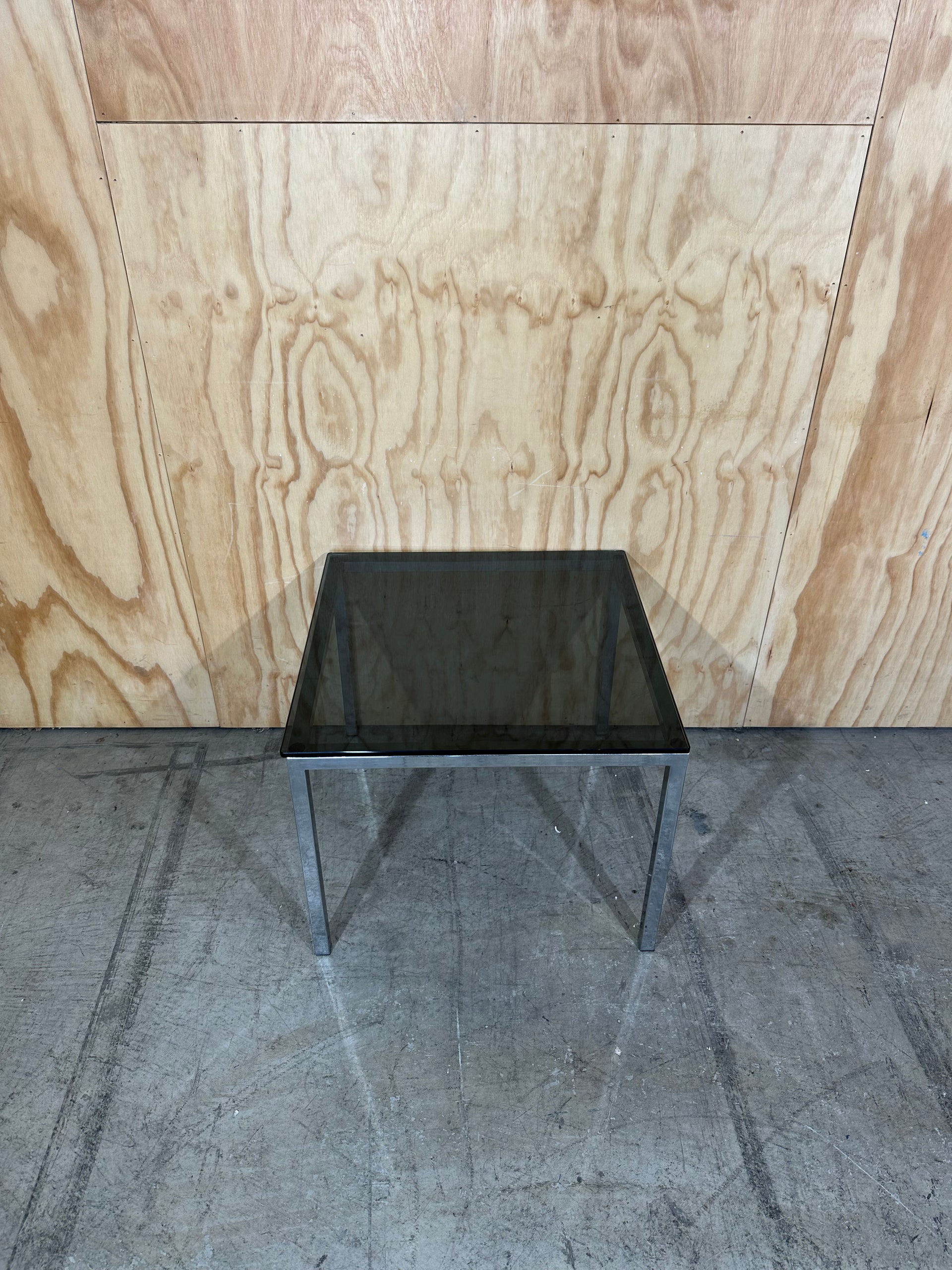 Square smoked glass coffee table on chrome base – Green Collect
