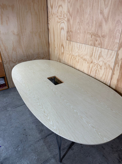 Boardroom table in beech veneer with Eiffel tower legs