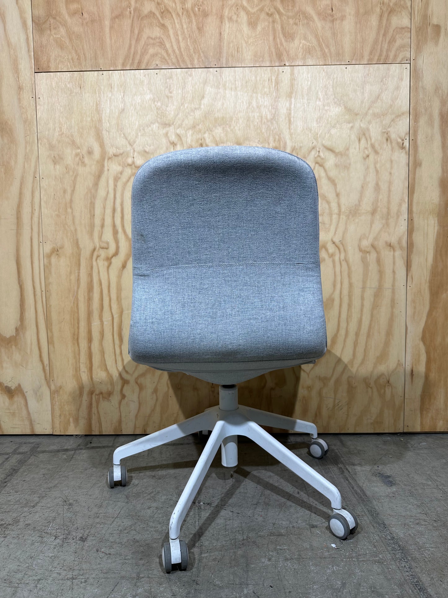 Light grey office swivel chair on castors