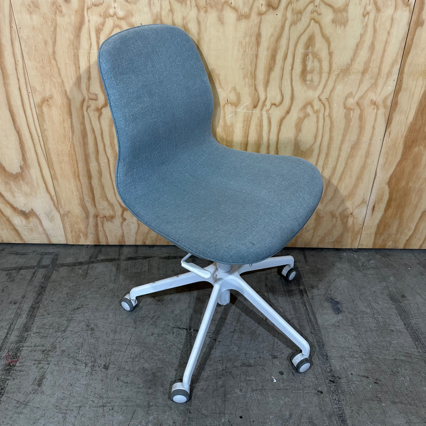 Light blue office swivel chair on castors