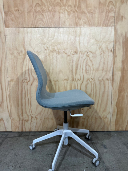 Light blue office swivel chair on castors