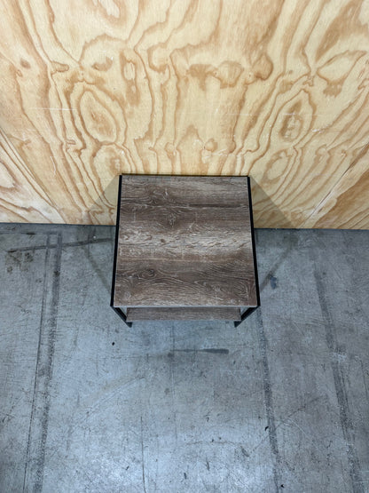 Timber laminate coffee table on black metal frame
